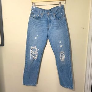 Levi’s | 501 light wash distressed knee button fly jean 26